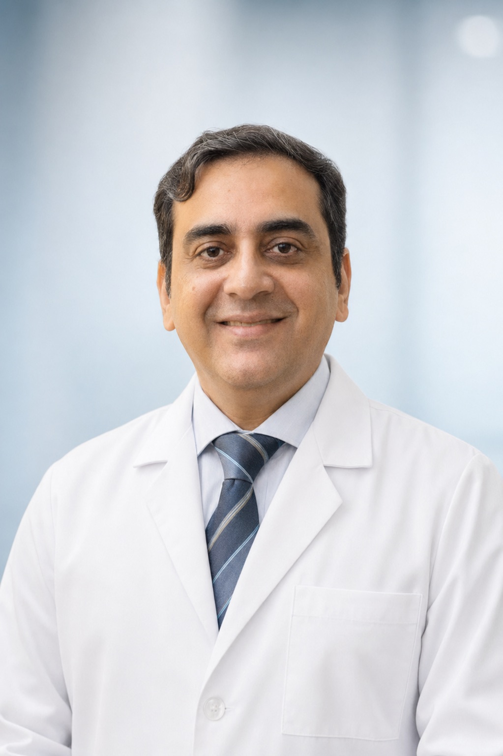 Dr. Tarun Baweja